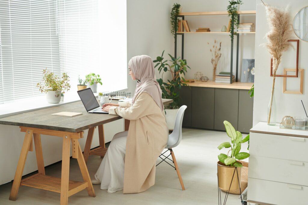 Woman In Modern Office Room